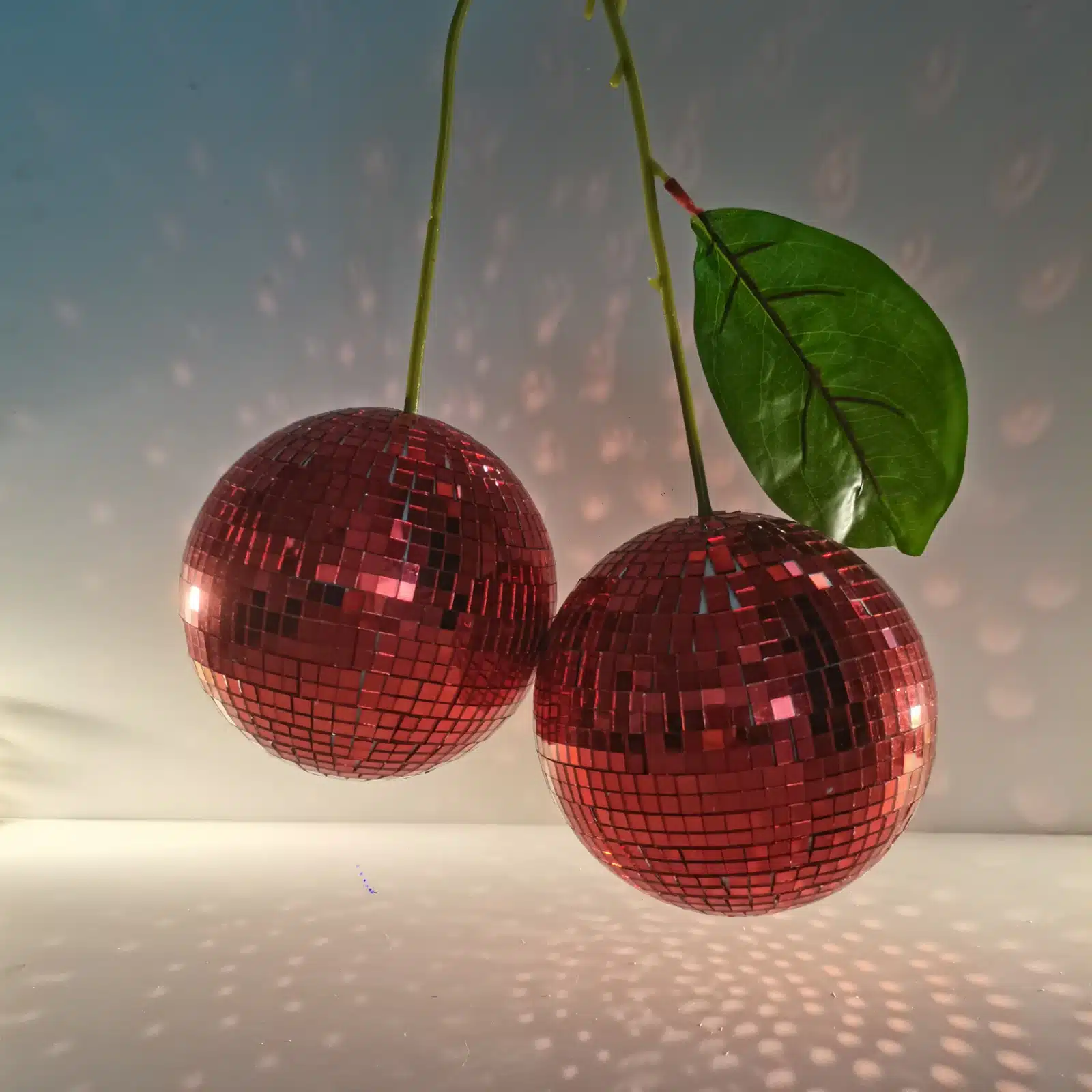 new cherry disco mirror ball hanging reflects