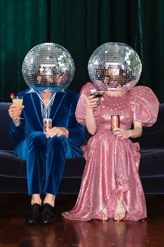 How did disco balls influence the evolution of stage lighting?