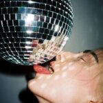 The role of disco balls in famous movie scenes
